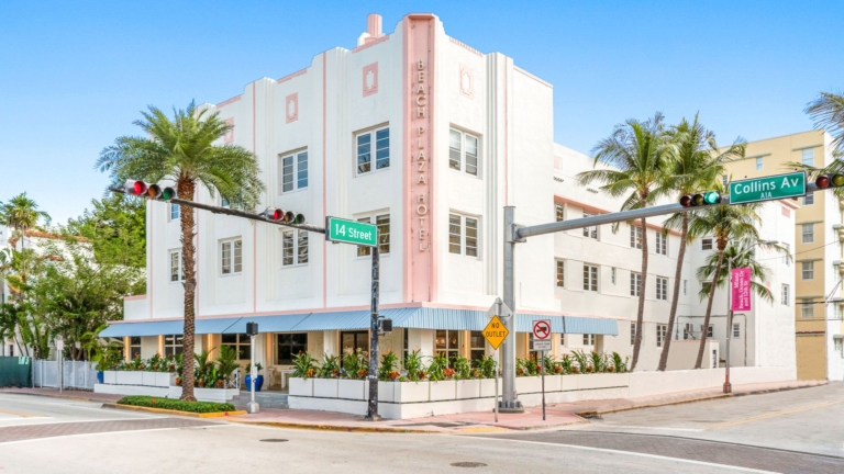 Corendon Beach Plaza – South Beach Miami, white 1936 Art Deco building with pink trim on the corner of Collins Avenue and 14th Street
